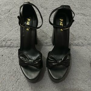 Black platform heels from fashion nova